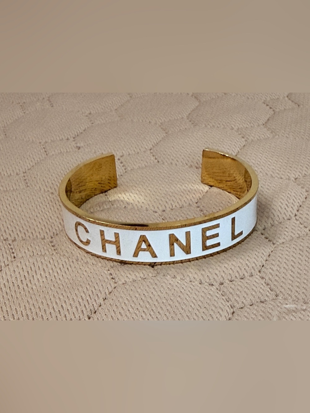 CHANEL EUC White Enamel 
Logo Cuff Bracelet Gold Tone 
Made in France  One Size